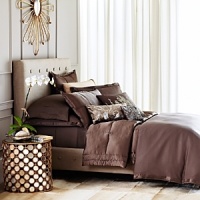 Simply luxurious bedding for the modern home. This sham adds a layer of shine in solid silk with a tufted border. Reverses to solid cotton. Simply luxurious bedding for the modern home. This sham adds a layer of shine in solid silk with a tufted border. Reverses to solid cotton.
