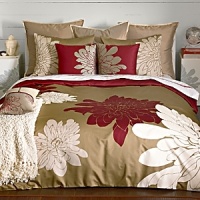 Defying standard repeat patterns, signature chrysanthemums are rendered in a stunning scale across the entire surface of the set. Crisp pure white and bright lacquer red bloom against a warm grey ground and reverses to lacquer red. Matching pillow shams feature a double flange. Set includes duvet cover and two shams; Twin set includes one sham. Duvet cover features button closure; Shams feature envelope closure. Defying standard repeat patterns, signature chrysanthemums are rendered in a stunning scale across the entire surface of the set. Crisp pure white and bright lacquer red bloom against a warm grey ground and reverses to lacquer red. Matching pillow shams feature a double flange. Set includes duvet cover and two shams; Twin set includes one sham. Duvet cover features button closure; Shams feature envelope closure.