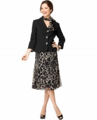 Kasper gives this suit a shot of animal-inspired aesthetic with a printed skirt and matching, removable scarf. Kasper gives this suit a shot of animal-inspired aesthetic with a printed skirt and matching, removable scarf.