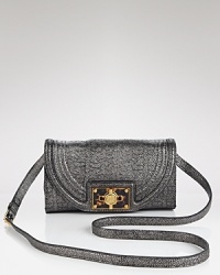 Tory Burch adds a touch of easy elegance to any look with this clutch, styled in subtle, stingray-embossed leather. The turnlock closure opens to a lined interior with a zip pocket and two slip pockets. Tory Burch adds a touch of easy elegance to any look with this clutch, styled in subtle, stingray-embossed leather. The turnlock closure opens to a lined interior with a zip pocket and two slip pockets.