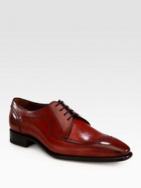 An illustrious design tailor made for the polished professional, in sleek, glossy calfskin leather.Washed leather upperLeather liningPadded insoleLeather soleMade in Italy An illustrious design tailor made for the polished professional, in sleek, glossy calfskin leather.Washed leather upperLeather liningPadded insoleLeather soleMade in Italy