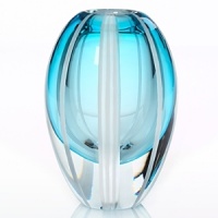 Evolution by Waterford is the newest creative vision for today's decorator. Each piece of art glass is mouth blown and encased with color, creating a dramatic presence. The blue/green colorway evokes the feeling of being near a tranquil sea on a flawless summer day. Evolution by Waterford is the newest creative vision for today's decorator. Each piece of art glass is mouth blown and encased with color, creating a dramatic presence. The blue/green colorway evokes the feeling of being near a tranquil sea on a flawless summer day.