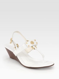 Vibrant leather silhouette has an adjustable slingback, thong front and goldtone designer emblem. Stacked wooden wedge, 2 (50mm)Leather upperLeather liningRubber solePadded insoleImportedOUR FIT MODEL RECOMMENDS ordering true size. Vibrant leather silhouette has an adjustable slingback, thong front and goldtone designer emblem. Stacked wooden wedge, 2 (50mm)Leather upperLeather liningRubber solePadded insoleImportedOUR FIT MODEL RECOMMENDS ordering true size.