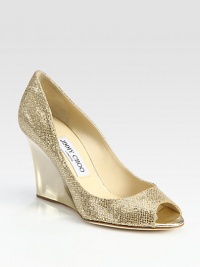 From the 24:7 Collection. Textured, glitter-coated silhouette with a mirrored metallic leather wedge and subtle peep toe. Metallic leather-covered wedge, 3½ (90mm)Glitter-coated metallic leather upperLeather liningBuffed leather solePadded insoleMade in Italy From the 24:7 Collection. Textured, glitter-coated silhouette with a mirrored metallic leather wedge and subtle peep toe. Metallic leather-covered wedge, 3½ (90mm)Glitter-coated metallic leather upperLeather liningBuffed leather solePadded insoleMade in Italy