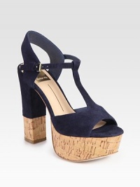 Sophisticated suede t-strap has a comfortable slingback and towering cork platform. Cork and suede-trim heel, 5 (125mm)Cork platform, 1½ (40mm)Compares to a 3½ heel (90mm)Suede upperLeather lining and solePadded insoleImportedOUR FIT MODEL RECOMMENDS ordering one half size up as this style runs small. Sophisticated suede t-strap has a comfortable slingback and towering cork platform. Cork and suede-trim heel, 5 (125mm)Cork platform, 1½ (40mm)Compares to a 3½ heel (90mm)Suede upperLeather lining and solePadded insoleImportedOUR FIT MODEL RECOMMENDS ordering one half size up as this style runs small.