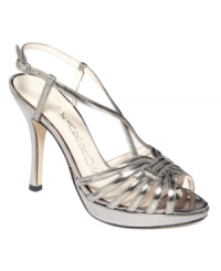Stay in the moment. The Zone evening sandals by Caparros are everything you need in a shiny, strappy sandal. Stay in the moment. The Zone evening sandals by Caparros are everything you need in a shiny, strappy sandal.