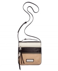 From downtown hipsters to uptown moms, this leather crossbody from Calvin Klein is the perfect companion. Mod colorblocking is paired with classic hardware for a look that's altogether irresistible. From downtown hipsters to uptown moms, this leather crossbody from Calvin Klein is the perfect companion. Mod colorblocking is paired with classic hardware for a look that's altogether irresistible.