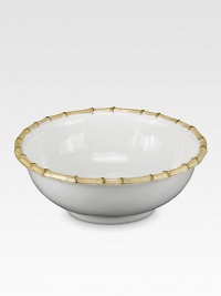 An elegant, sculptural and incredibly versatile serving bowl is crafted in ceramic stoneware and finished with handpainted detail. From the Classic Bamboo Collection 3-qt. capacity 4H X 11 diam. Dishwasher safe Imported 