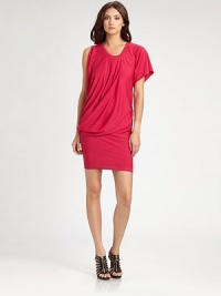 Soft, vibrant jersey, tailored in an asymmetrical silhouette with a flattering side drape.Banded jewel necklineSingle short sleeveFront and back pleatsAsymmetrical side drapeAbout 23 from natural waist68% acetate/27% polyester/5% spandexHand washMade in USA of imported fabricModel shown is 5'10 (177cm) wearing US size Small. Soft, vibrant jersey, tailored in an asymmetrical silhouette with a flattering side drape.Banded jewel necklineSingle short sleeveFront and back pleatsAsymmetrical side drapeAbout 23 from natural waist68% acetate/27% polyester/5% spandexHand washMade in USA of imported fabricModel shown is 5'10 (177cm) wearing US size Small.