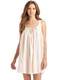 THE LOOKScoopneck with drawstring tie frontSleevelessBabydoll silhouetteSeamed back yokeTHE FITAbout 31 from shoulder to hemTHE MATERIALLaundered cotton batisteCARE & ORIGINMachine washImported THE LOOKScoopneck with drawstring tie frontSleevelessBabydoll silhouetteSeamed back yokeTHE FITAbout 31 from shoulder to hemTHE MATERIALLaundered cotton batisteCARE & ORIGINMachine washImported