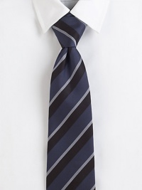 Simple stripes, thick and thin, on elegant Italian silk.SilkDry cleanMade in Italy Simple stripes, thick and thin, on elegant Italian silk.SilkDry cleanMade in Italy