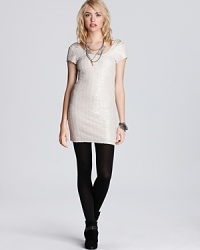 This Free People dress brings on the heat, in a shining metallic fabric with a sultry plunging back. This Free People dress brings on the heat, in a shining metallic fabric with a sultry plunging back.