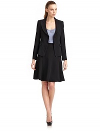 THE LOOKPeaked lapelFront button closureLong sleeves with padded shouldersDarts Seam at waistFront flap pocketsBack geometric seam detailsVented back hemTHE FITAbout 23 from shoulder to hemTHE MATERIALVirgin woolFully linedCARE & ORIGINDry cleanMade in ItalyModel shown is 5'10½ (179cm) wearing US size 4. THE LOOKPeaked lapelFront button closureLong sleeves with padded shouldersDarts Seam at waistFront flap pocketsBack geometric seam detailsVented back hemTHE FITAbout 23 from shoulder to hemTHE MATERIALVirgin woolFully linedCARE & ORIGINDry cleanMade in ItalyModel shown is 5'10½ (179cm) wearing US size 4.