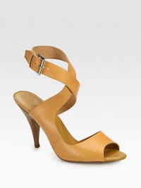 Elegantly crossed ankle straps top this leather silhouette with a tall stacked heel. Stacked heel, 4 (100mm)Leather upperAdjustable ankle strapLeather lining and solePadded insoleImported Elegantly crossed ankle straps top this leather silhouette with a tall stacked heel. Stacked heel, 4 (100mm)Leather upperAdjustable ankle strapLeather lining and solePadded insoleImported