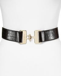Cole Haan defines the waist with croc-embossed leather and a bold interlocking buckle. Cole Haan defines the waist with croc-embossed leather and a bold interlocking buckle.
