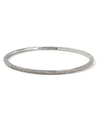 Nod to Juicy Couture's signature glamour with this silver plated bangle, accented by a delicate rim of crystal stones. It's all in the glitz. Nod to Juicy Couture's signature glamour with this silver plated bangle, accented by a delicate rim of crystal stones. It's all in the glitz.
