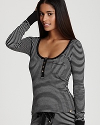 Sweet dreams in stripes: Juicy Couture's scoop-neck henley features on-trend stripes and a cute heart charm detail. Sweet dreams in stripes: Juicy Couture's scoop-neck henley features on-trend stripes and a cute heart charm detail.