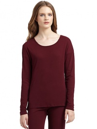 THE LOOKRoundneckPullover styleLong sleevesLonger curved back hemTHE FITAbout 24 from shoulder to hemTHE MATERIALCotton/rayonCARE & ORIGINMachine washImported THE LOOKRoundneckPullover styleLong sleevesLonger curved back hemTHE FITAbout 24 from shoulder to hemTHE MATERIALCotton/rayonCARE & ORIGINMachine washImported