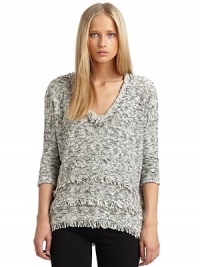 THE LOOKAllover marled knit constructionThree-quarter length sleevesFringe trimTiered detail at hemTHE FITAbout 27 from shoulder to hemTHE MATERIAL58% cotton/18% nylon/12% wool/12% acrylicCARE & ORIGINDry cleanImportedModel shown is 5'10 (177cm) wearing US size Small. THE LOOKAllover marled knit constructionThree-quarter length sleevesFringe trimTiered detail at hemTHE FITAbout 27 from shoulder to hemTHE MATERIAL58% cotton/18% nylon/12% wool/12% acrylicCARE & ORIGINDry cleanImportedModel shown is 5'10 (177cm) wearing US size Small.