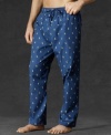 A cozy pajama pant is tailored for a relaxed fit from soft cotton broadcloth with an allover pony print for iconic style.