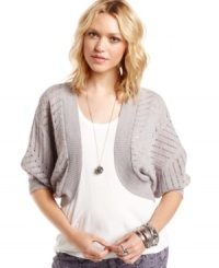 Slip on this open-knit shrug from Cotton Emporium for a simple way to add fresh style to your look! Cool metallic threading makes it a cute piece for day or night. Slip on this open-knit shrug from Cotton Emporium for a simple way to add fresh style to your look! Cool metallic threading makes it a cute piece for day or night.