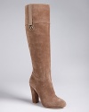 Joan & David gives you tall platform boots dressed up in suede with elegant, equestrian-inpsired leather side tab details.