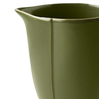 Borrowing from nature, this porcelain creamer has a highly glossed surface and unusual contours, creating an interesting silhouette - a DVF signature - on the table. Borrowing from nature, this porcelain creamer has a highly glossed surface and unusual contours, creating an interesting silhouette - a DVF signature - on the table.