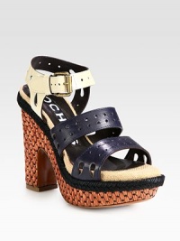 Textured raffia lifts this strappy leather design with perforated details and soft rope edging. Raffia heel, 4½ (115mm)Raffia platform, 1 (25mm)Compares to a 3½ heel (90mm)Leather upperAdjustable ankle strapLeather lining and solePadded insoleMade in Italy Textured raffia lifts this strappy leather design with perforated details and soft rope edging. Raffia heel, 4½ (115mm)Raffia platform, 1 (25mm)Compares to a 3½ heel (90mm)Leather upperAdjustable ankle strapLeather lining and solePadded insoleMade in Italy