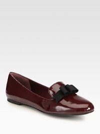 A dimensional grosgrain ribbon bow tops this must-have favorite, crafted of reflective patent leather. Patent leather upper with grosgrain ribbon bowLeather lining and solePadded insoleImported A dimensional grosgrain ribbon bow tops this must-have favorite, crafted of reflective patent leather. Patent leather upper with grosgrain ribbon bowLeather lining and solePadded insoleImported