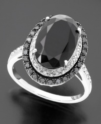 The dramatic contrast of oval-cut onyx (14x9 mm) and round and oval-cut diamonds (1/3 ct. t.w.) creates an ornate and beautiful ring set in sterling silver. Item comes in a festive red gift box. The dramatic contrast of oval-cut onyx (14x9 mm) and round and oval-cut diamonds (1/3 ct. t.w.) creates an ornate and beautiful ring set in sterling silver. Item comes in a festive red gift box.