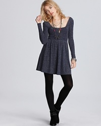 Day wear goes down to the disco with this Free People dress, in a metallic stretch knit with plenty of groove to spare. Day wear goes down to the disco with this Free People dress, in a metallic stretch knit with plenty of groove to spare.