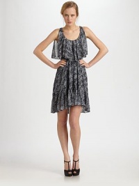 Airy, printed scoopneck with a playful ruffle overlay and semi-sheer, hi-low hem. Scoopneck with ruffle overlaySleevelessRuffled hi-low hemSide zipperFully linedAbout 25 from natural waistPolyesterDry cleanImported of Italian fabricModel shown is 5'10 (177cm) wearing US size 4.