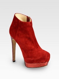 Python heel and platform infuse this zip-up suede ankle boot with animal magnetism. Python heel, 5 (125mm)Python platform, 1½ (40mm)Compares to a 3½ heel (90mm)Suede upperSide zipperLeather lining and solePadded insoleMade in ItalyOUR FIT MODEL RECOMMENDS ordering one size up as this style runs small. Python heel and platform infuse this zip-up suede ankle boot with animal magnetism. Python heel, 5 (125mm)Python platform, 1½ (40mm)Compares to a 3½ heel (90mm)Suede upperSide zipperLeather lining and solePadded insoleMade in ItalyOUR FIT MODEL RECOMMENDS ordering one size up as this style runs small.