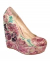 A lovely flower-printed leather covers this femme design for a sweet, lady-like allure. The Reilly Platform Wedge Pumps from Betsey Johnson will add the perfect amount of whimsy to any look.