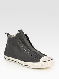 Canvas high-top design with a contrasting rubber toecap and sole, modernized by a laceless front. Leather liningPadded insoleRubber soleImported