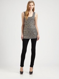 Dazzle the crowd in this lengthy scoopback tank fronted by sparkling embellishments. ScoopneckSleevelessScoopbackLonger length hits below the hips94% rayon/6% spandexDry cleanMade in USA of Italian fabricModel shown is 5'10 (177cm) wearing US size Small. Dazzle the crowd in this lengthy scoopback tank fronted by sparkling embellishments. ScoopneckSleevelessScoopbackLonger length hits below the hips94% rayon/6% spandexDry cleanMade in USA of Italian fabricModel shown is 5'10 (177cm) wearing US size Small.