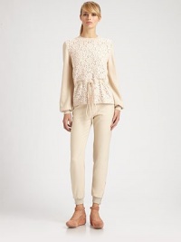 Romantic floral lace panels and a flattering drawstring waist elevate this knit, cashmere-blend design.Rib-knit crewneck and cuffsLace front panelBanded drawstring waistSilk liningWool/cashmere/cotton/polyamideDry cleanMade in Italy of imported fabricModel shown is 5'11 (180cm) wearing US size Small. Romantic floral lace panels and a flattering drawstring waist elevate this knit, cashmere-blend design.Rib-knit crewneck and cuffsLace front panelBanded drawstring waistSilk liningWool/cashmere/cotton/polyamideDry cleanMade in Italy of imported fabricModel shown is 5'11 (180cm) wearing US size Small.