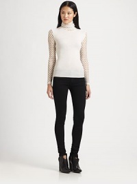 Edgy fishnet paneling emboldens this timeless merino wool sweater with ribbed trim. Fishnet turtleneckLong fishnet sleevesRibbed cuffs and hemMerino woolDry cleanMade in ItalyModel shown is 5'10 (177cm) wearing US size Small. Edgy fishnet paneling emboldens this timeless merino wool sweater with ribbed trim. Fishnet turtleneckLong fishnet sleevesRibbed cuffs and hemMerino woolDry cleanMade in ItalyModel shown is 5'10 (177cm) wearing US size Small.