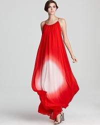 Flaunting a red and white ombre color treatment, this silk French Connection maxi dress makes an allusion to the fiery sun for fashion-forward, day-to-night style. Flaunting a red and white ombre color treatment, this silk French Connection maxi dress makes an allusion to the fiery sun for fashion-forward, day-to-night style.