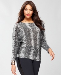 Snakeskin print goes downtown with a raglan-sleeve plus size top from INC! There's a surprise in back, too -- a slightly sheer solid inset! Snakeskin print goes downtown with a raglan-sleeve plus size top from INC! There's a surprise in back, too -- a slightly sheer solid inset!