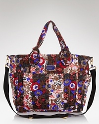 A bold wallpaper floral print is an eye-catching touch on this ever-practical baby bag from MARC BY MARC JACOBS. Crafted from durable nylon with pockets for bottles, bibs, and burp cloths, it's a cool mom's carryall.