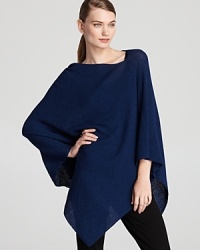 Transition into the new season by topping off your look with a lush layer. Rendered in decadent wool, this Eileen Fisher poncho touts a delicious jewel tone for a luxe approach to laid-back style. Transition into the new season by topping off your look with a lush layer. Rendered in decadent wool, this Eileen Fisher poncho touts a delicious jewel tone for a luxe approach to laid-back style.