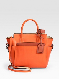 A versatile top-handle carryall crafted from glazed glovetan and vachetta leather. Double top handles, 4¼ dropRemovable, adjustable shoulder strap, 21-22½ dropFront pocket with removable zip pouchBack slide pocketProtective leather feetTwo inside zip pocketsInner zip pouchCotton lining9W X 10H X 5DImported A versatile top-handle carryall crafted from glazed glovetan and vachetta leather. Double top handles, 4¼ dropRemovable, adjustable shoulder strap, 21-22½ dropFront pocket with removable zip pouchBack slide pocketProtective leather feetTwo inside zip pocketsInner zip pouchCotton lining9W X 10H X 5DImported