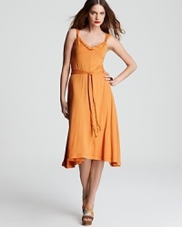 A vibrant Elie Tahari dress is this season's silhouette to play out all your fashion fantasies. Slip it over bikinis or amp it up with metallic accents. A vibrant Elie Tahari dress is this season's silhouette to play out all your fashion fantasies. Slip it over bikinis or amp it up with metallic accents.