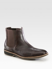 Hand-painted leather boot with Nike technology, for superior comfort and support.Partial leather liningPadded insoleRubber soleImported Hand-painted leather boot with Nike technology, for superior comfort and support.Partial leather liningPadded insoleRubber soleImported
