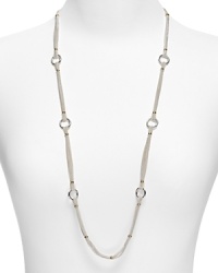 Add a chic accent to your look with this multi-chain necklace with shining stations from Lauren Ralph Lauren.