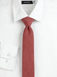 Simple, yet sophisticated skinny tie neatly woven in a textured cotton twill design.CottonDry cleanMade in United Kingdom Simple, yet sophisticated skinny tie neatly woven in a textured cotton twill design.CottonDry cleanMade in United Kingdom