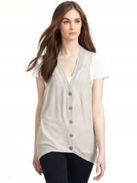 THE LOOKSleevelessOpenwork detail at shouldersButtonfrontGraduated hemlineTHE FITAbout 26 from shoulder to longest point of hemTHE MATERIALLinenCARE & ORIGINDry cleanImportedModel shown is 5'8½ (174cm) wearing US size Small. THE LOOKSleevelessOpenwork detail at shouldersButtonfrontGraduated hemlineTHE FITAbout 26 from shoulder to longest point of hemTHE MATERIALLinenCARE & ORIGINDry cleanImportedModel shown is 5'8½ (174cm) wearing US size Small.