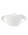 Servingware with an elegant and swirling silhouette. The New Wave covered vegetable bowl is crafted of fine china and makes a refined statement on any table. From Villeroy & Boch's dinnerware and dishes collection.