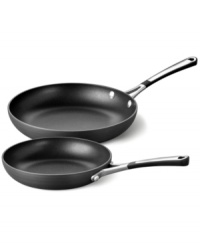 From hash browns to fried eggs, this skillet set from Simply Calphalon is a cooking jack-of-all-trades. A truly indispensable duo browns and sautés beautifully, while also releasing food with professional ease thanks to its double coating of exclusive nonstick formula. 10-year warranty. From hash browns to fried eggs, this skillet set from Simply Calphalon is a cooking jack-of-all-trades. A truly indispensable duo browns and sautés beautifully, while also releasing food with professional ease thanks to its double coating of exclusive nonstick formula. 10-year warranty.